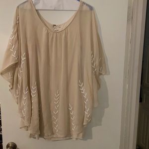 Free people beige silky mini dress with Devon detail. Light beige